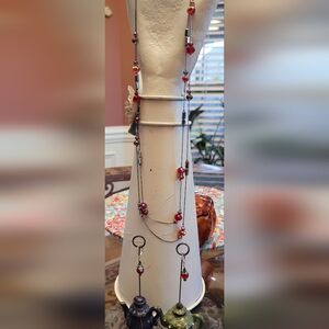 Very pretty red stone necklace and earrings.